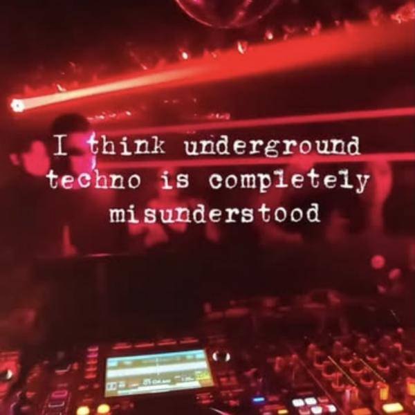 DJ booth under red lights